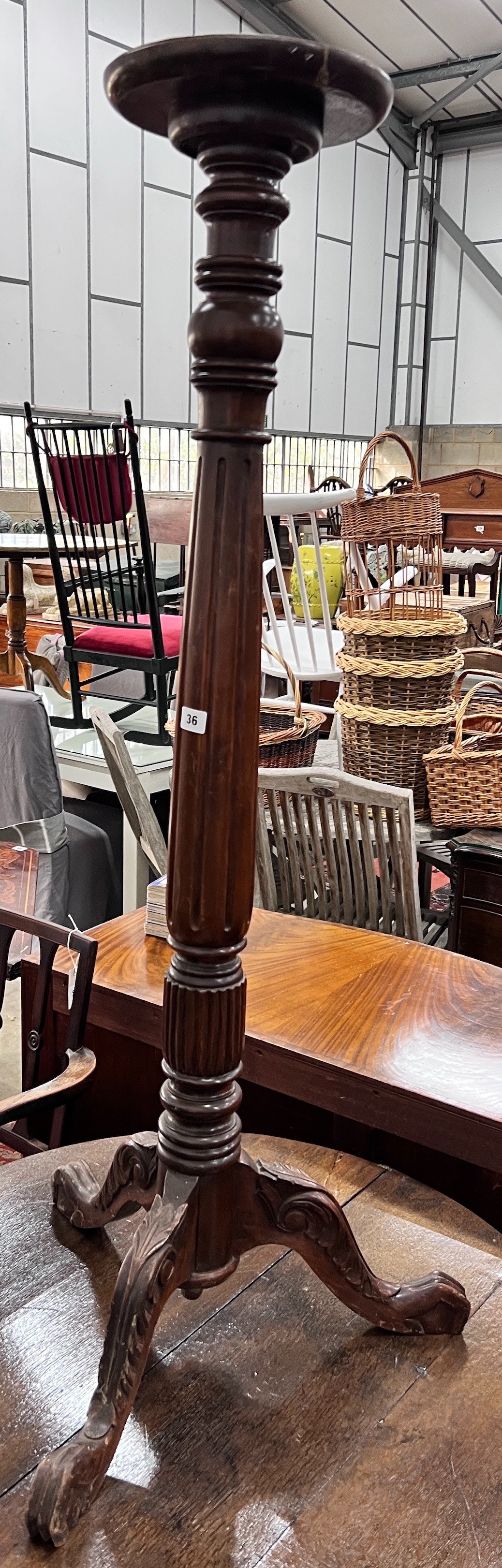 A George III style mahogany torchere, height 131cm *Please note the sale commences at 9am.